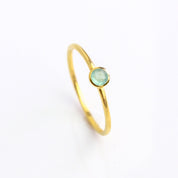 Single gold plated dainty 3mm aqua chalcedony gemstone ring. march  birthstone. On white background. 925 sterling silver, birthstone ring, stacking ring, stackable, birthstone jewelry, facet gemstone