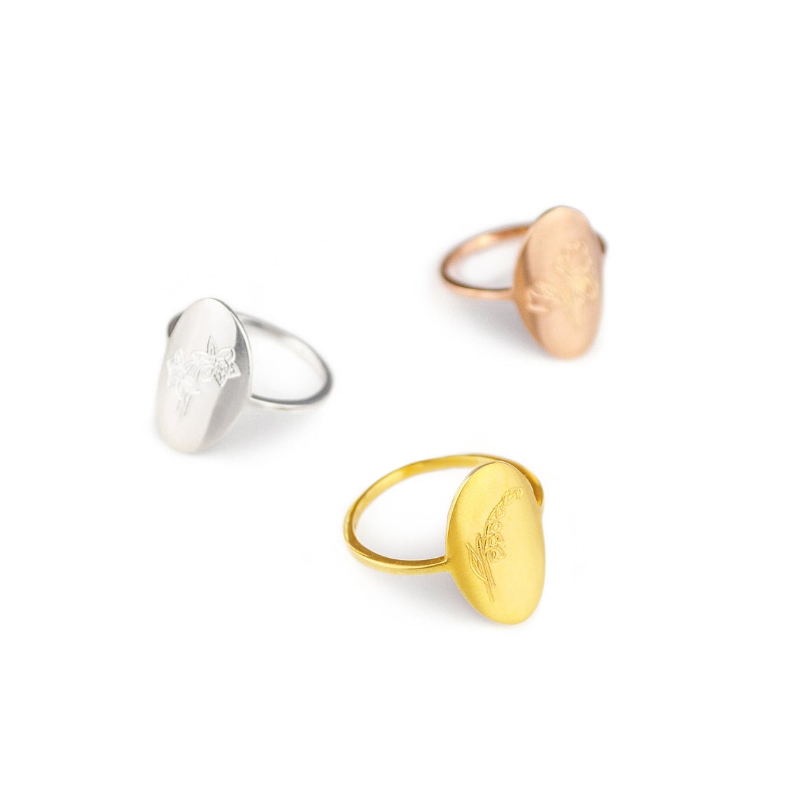 Set of three custom engraved flower floral rings available in sterling silver, gold and rose gold