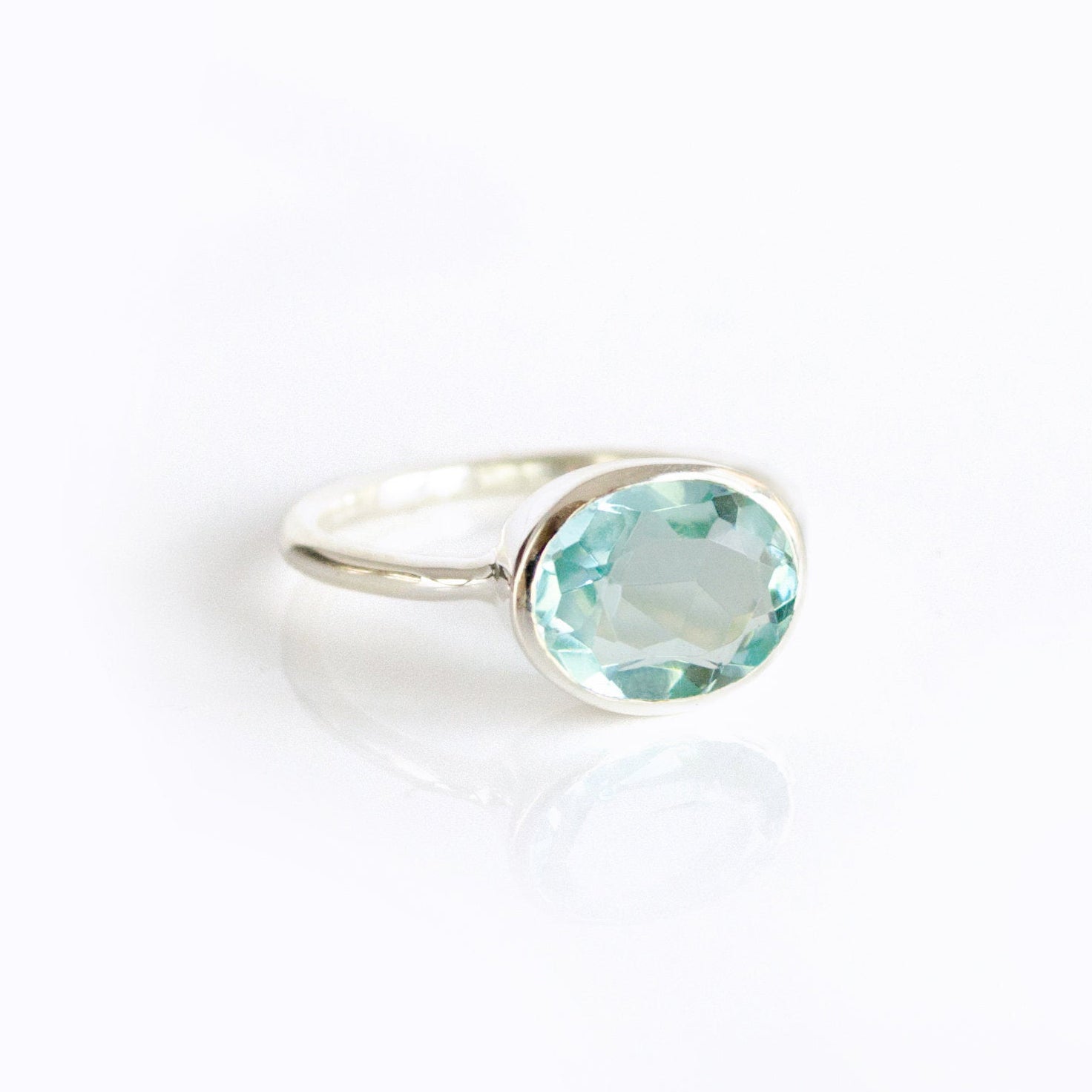 Oval Blue Topaz ring, London Blue Topaz jewelry, December birthstone ring, Light blue gemstone, Bezel set Topaz, Sterling silver or gold, Blue Topaz faceted ring, December gift, Blue Quartz ring, Topaz jewelry