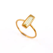 Single rose gold filled adira tiny bar citrine gemstone ring. November birthstone on white back ground. 