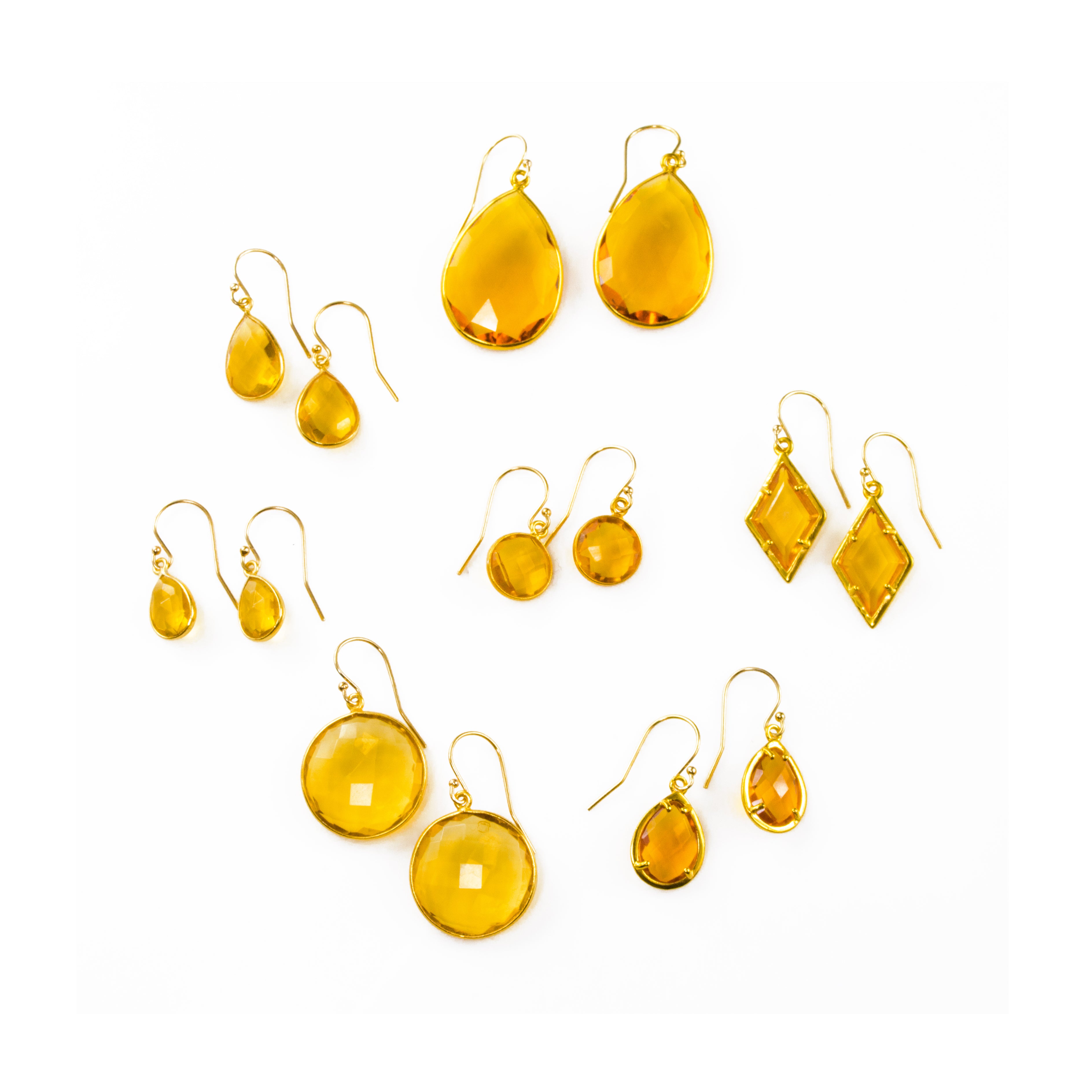 Shop our citrine earrings collection available in large, medium and small teardrops, prong set teardrop, prong set diamond, large and medium rounds on white background