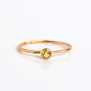 Rose gold plated citrine gemstone ring. dainty 3mm citrine gemstone ring. November birthstone. On white background. 