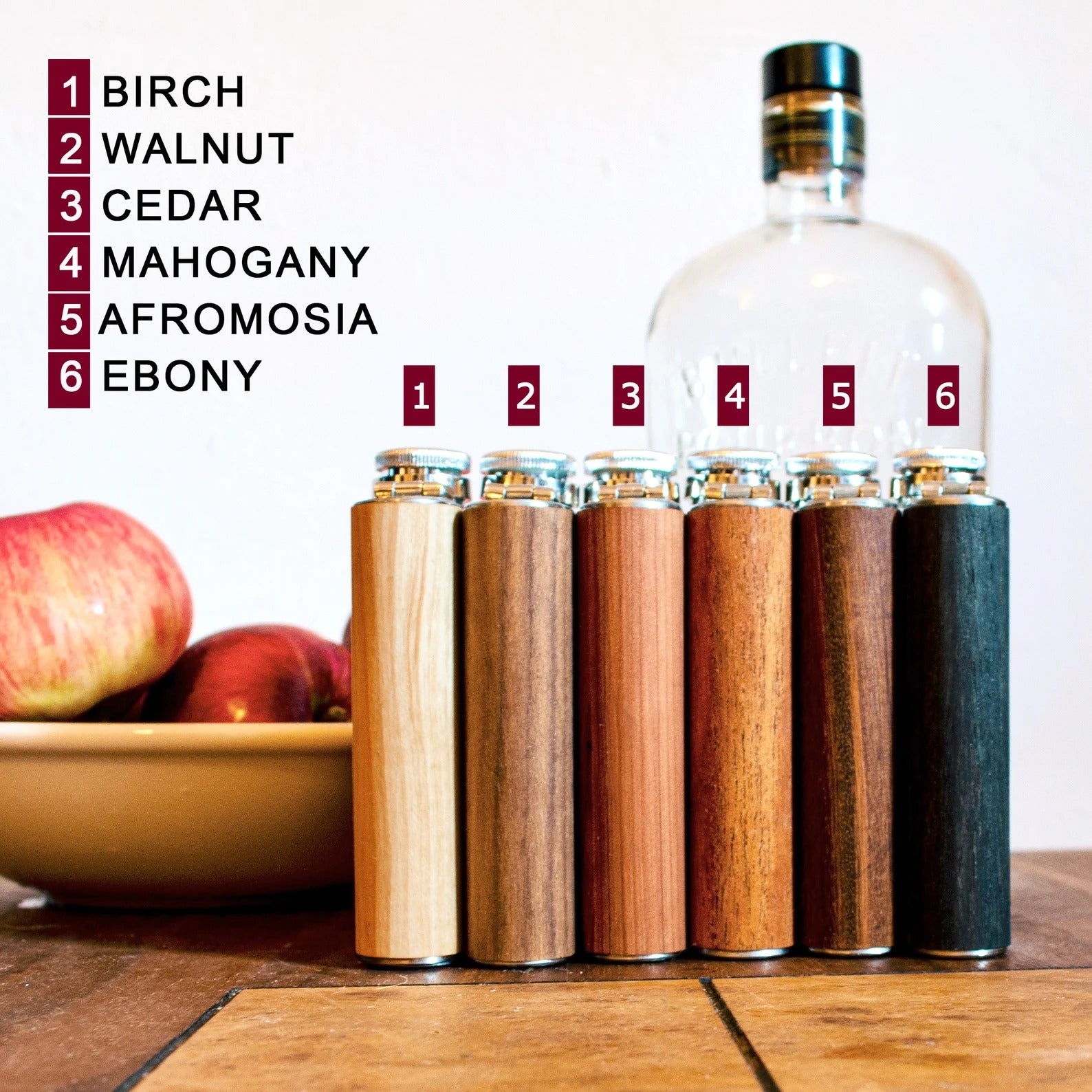 Six natural wood selection for our personalized flasks in ebony, walnut, birch, afromosia, mahogany and cedar. Fantastic as party favor, christmas gifts, or gifts for Dad, husband or boyfriend.