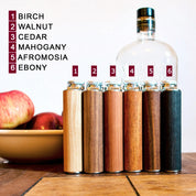 Six natural wood selection for our personalized flasks in ebony, walnut, birch, afromosia, mahogany and cedar. Fantastic as party favor, christmas gifts, or gifts for Dad, husband or boyfriend.