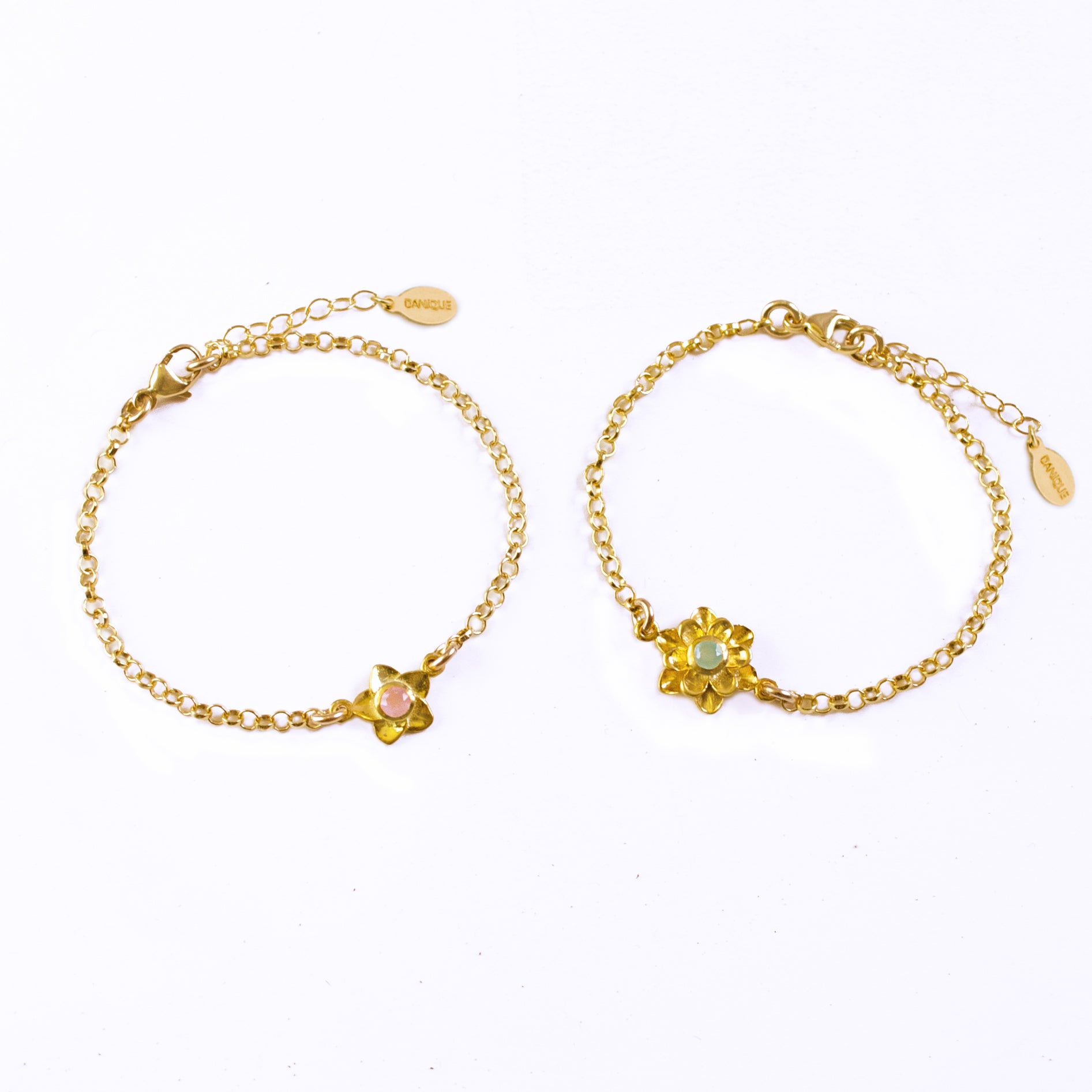 Two gold filled bloom bracelets featuring one birthstone each. Left is pink chalcedony and right is aqua chalcedony. 