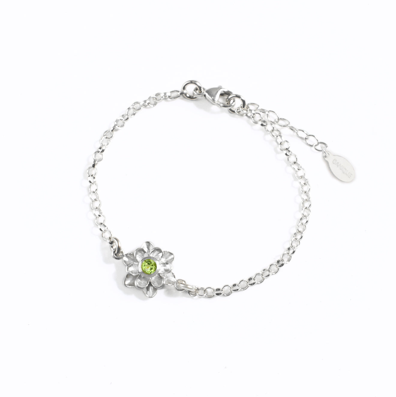 Sterling silver bloom bracelet with single mother flower with peridot birthstone on white background. 
