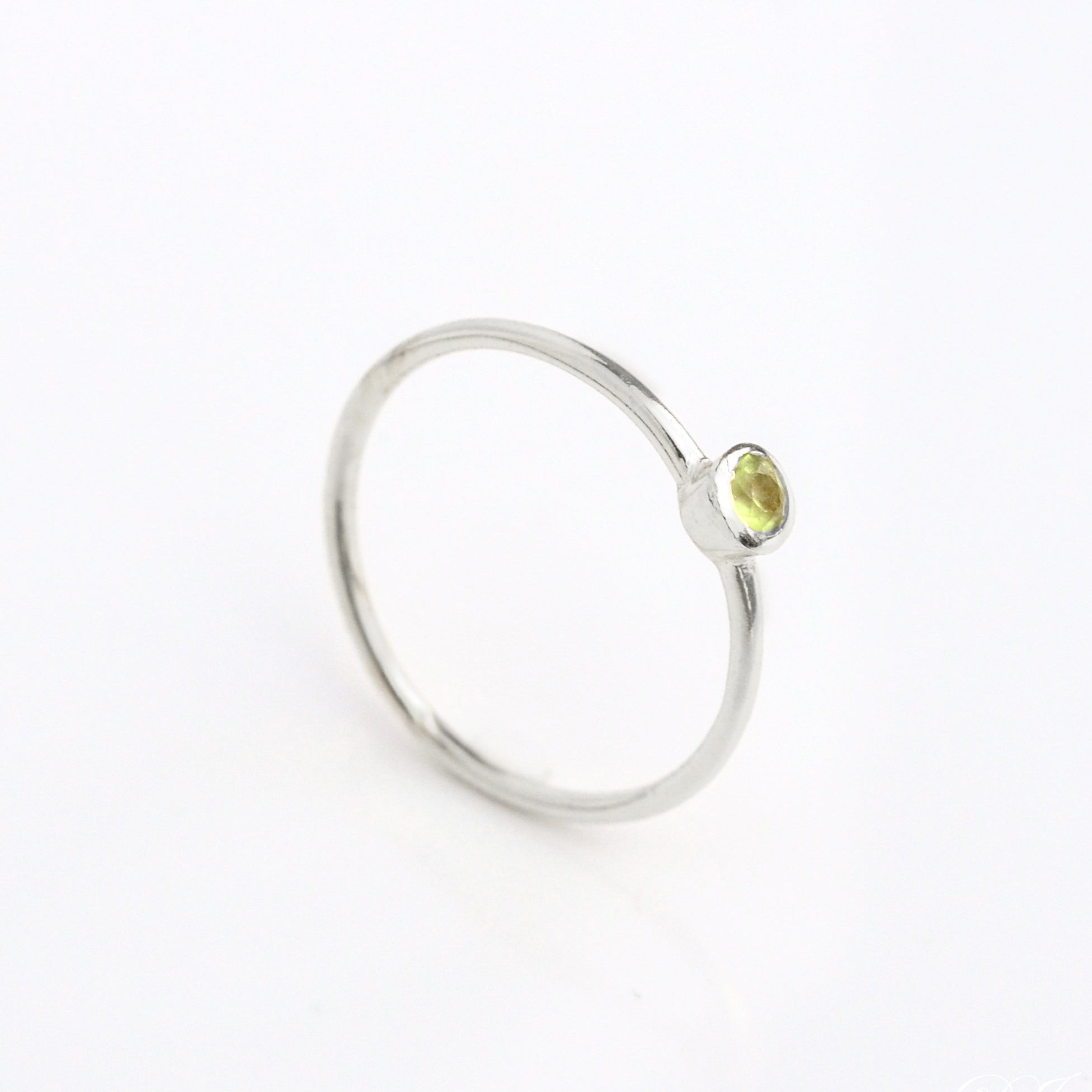 sterling silver dainty 3mm Green Amethyst gemstone ring. February birthstone. On white background. 925 sterling silver, birthstone ring, stacking ring, stackable, birthstone jewelry, facet gemstone