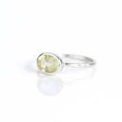 a sterling silver green amethyst ring shown on white background. green gemstone, green birthstone, february birthstone, february gemstone, stack set, stacking rings, gemstone ring, birthstone ring, mother's day gift for her, gift for mom, gift for fiance, gift for girlfriend, wedding jewelry, bridesmaid jewelry, anniversary jewelry, anniversary gift, birthday gift, christmas gift, valentine's day gift, valentine's day rings, dainty ring, cocktail ring, statement ring, bezel set