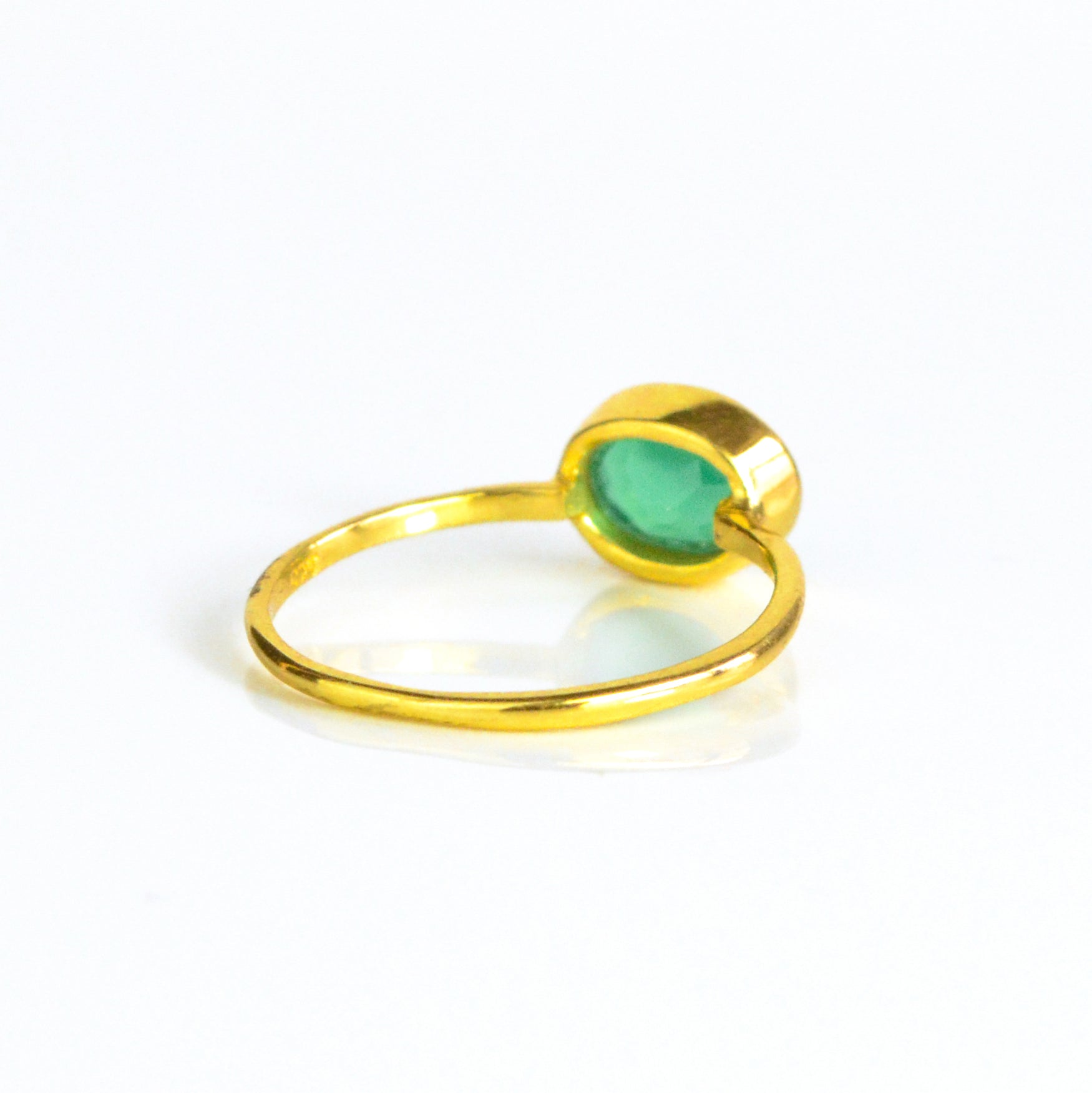 single gold plated back of the small oval green onyx ring. may birthstone green onyx stacking rings stackable rings birthstone ring birthstone jewelry, stack set, stacking rings, gemstone ring, birthstone ring, mother's day gift for her, gift for mom, gift for fiance, gift for girlfriend, wedding jewelry, bridesmaid jewelry, anniversary jewelry, anniversary gift, birthday gift, christmas gift, valentine's day gift, valentine's day rings, dainty ring, cocktail ring, statement ring, bezel set