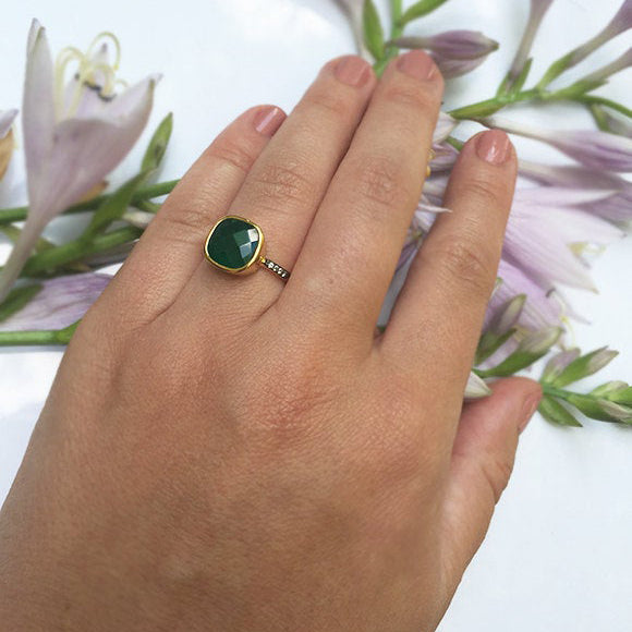 Model is wearing a gold plated green onyx pave with white topaz cushion bezel set ring. Sterling silver, stacking ring, stackable, green birthstone, may birthstone, green gemstone, green birthstone. 