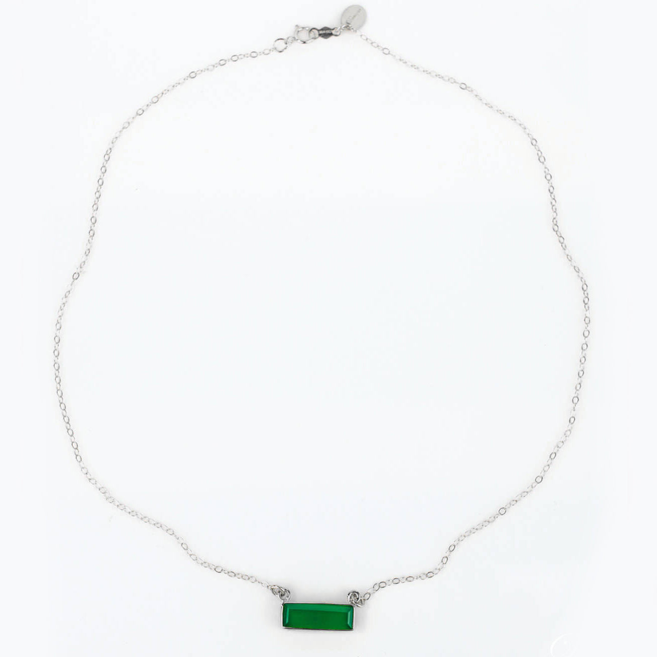 Single sterling silver chain with green tourmaline horizontal bar adira necklace on white background 
