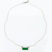Single sterling silver chain with green tourmaline horizontal bar adira necklace on white background 