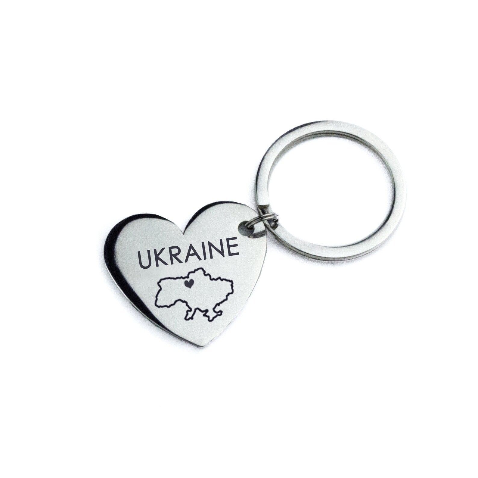 Heart shaped keychain engraved with Ukraine and heart in our Block font. 