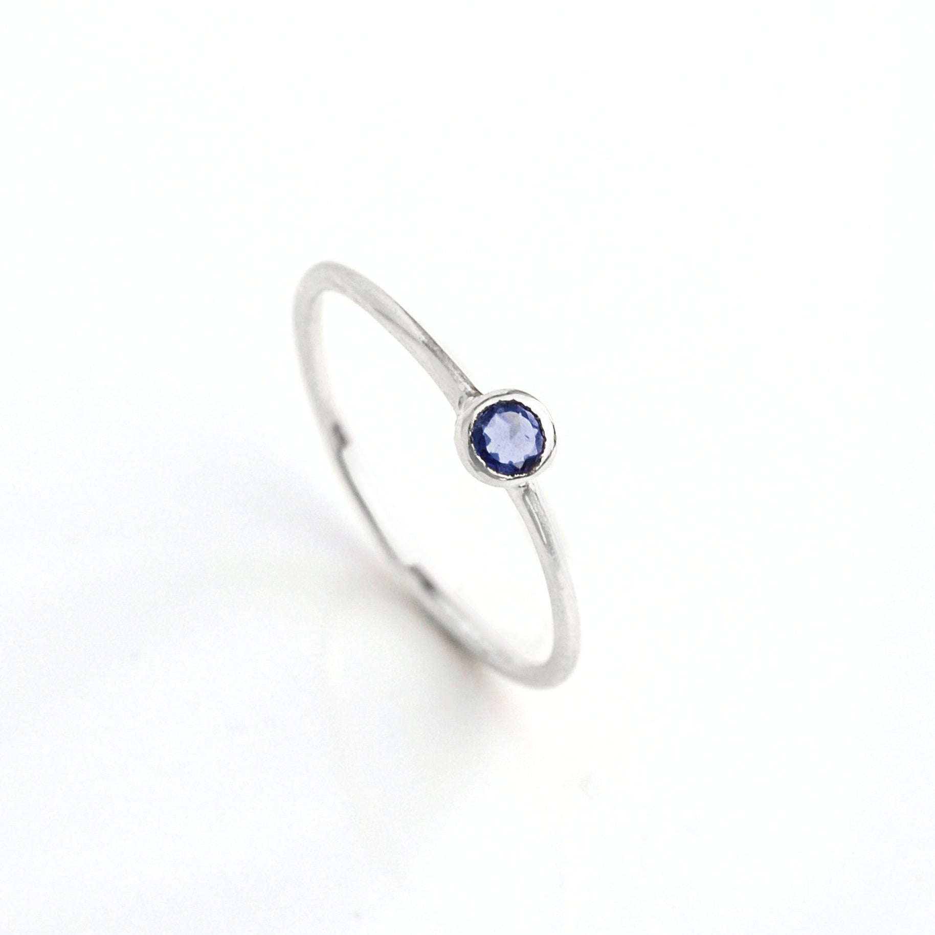 sterling silver dainty 3mm Kyanite gemstone ring. September  birthstone. On white background. 925 sterling silver, birthstone ring, stacking ring, stackable, birthstone jewelry, facet gemstone