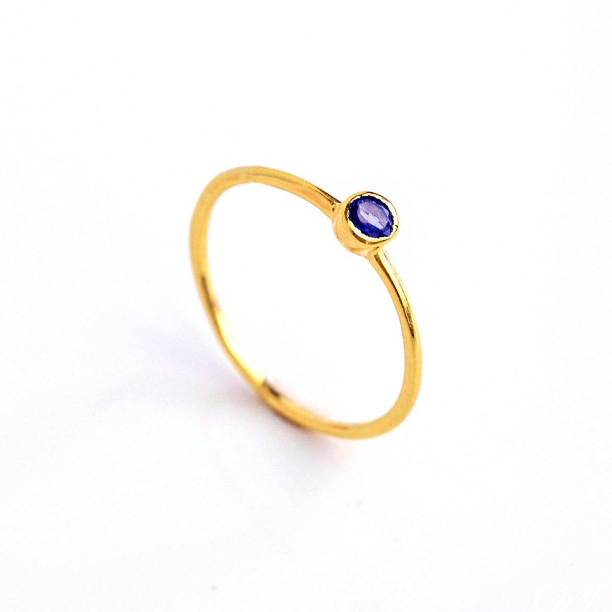Single gold plated dainty 3mm Kyanite gemstone ring. September  birthstone. On white background. 925 sterling silver, birthstone ring, stacking ring, stackable, birthstone jewelry, facet gemstone