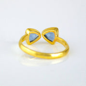 The back of a kyanite ring. Kyanite Quartz September birthstone ring, adjustable Kyanite triangle ring, personalized Kyanite jewelry, sterling silver Kyanite ring, gold Kyanite Quartz, rose gold Kyanite ring, unique Kyanite gemstone, custom triangle-cut Kyanite Quartz, bespoke Kyanite jewelry, elegant blue gemstone ring, trendy Kyanite bow tie ring, Kyanite stacking ring, custom birthstone jewelry, adjustable gemstone ring, chic blue Kyanite accessory, unique September birthstone ring, Kyanite Quartz gift