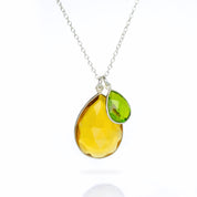 Single sterling silver cable chain with large citrine mothers stone and peridot children's stone