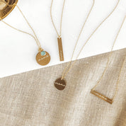 A mix of mama jewelry bar and disc necklaces together. Engraved bar necklace for mom with initials Personalized bar necklace for mama's birthday Custom family bar necklace for mom's gift Engraved bar pendant for mom's special day Personalized bar necklace for mother bear Custom bar necklace for moms with kids' birthstones Engraved family bar necklace for mama's heart