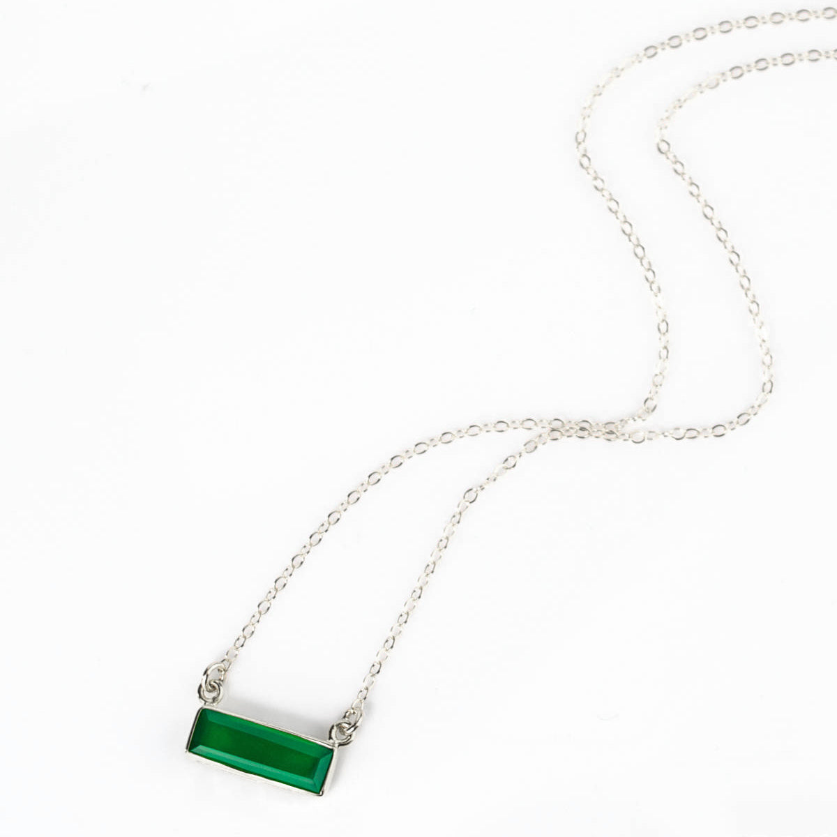 Single sterling silver chain with green tourmaline horizontal bar adira necklace on white background May birthstone adira series