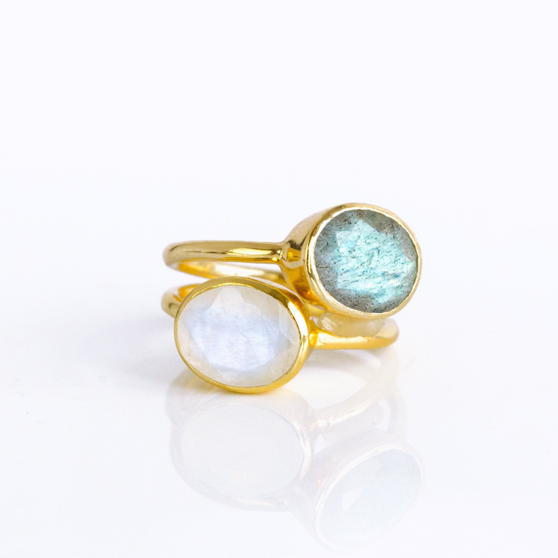 gold plated oval stacking rings with labradorite and moonstone gemstones. birthstone rings, gemstone rings stack ring stackable rings