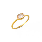 a gold morganite ring shown on white background. stackable! Stacking rings, bezel set, small oval, tiny oval, dainty oval, birthstone rings, sterling silver stamp, birthstone ring, birthstone jewelry, stack set, stacking rings, gemstone ring, birthstone ring, mother's day gift for her, gift for mom, gift for fiance, gift for girlfriend, wedding jewelry, bridesmaid jewelry, anniversary jewelry, anniversary gift, birthday gift, christmas gift, valentine's day gift, valentine's day rings, cocktail ring