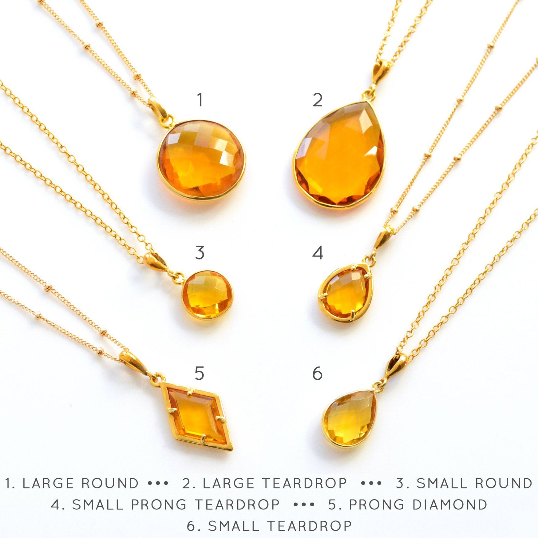 Shop our citrine necklace collection available in large, medium and small teardrops, prong set teardrop, prong set diamond, large and medium rounds on white background. Choose from satellite or cable chain. November birthstone. 