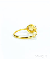 rear view of a gold small oval stacking ring featuring citrine. stackable! Stacking rings, bezel set, small oval, tiny oval, dainty oval, birthstone rings, sterling silver stamp