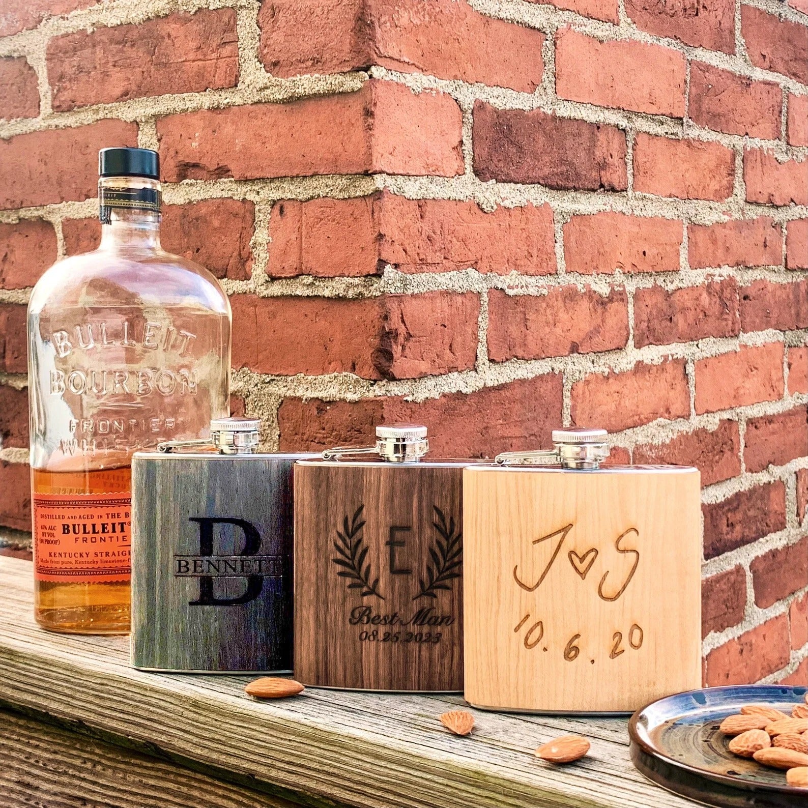 Three custom engraved wood flasks in ebony with name and message, walnut for the grooms gift and birch with handwriting design. Fantastic as party favor, christmas gifts, or gifts for Dad, husband or boyfriend.