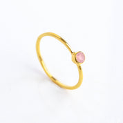 Single gold plated dainty 3mm pink chalcedony gemstone ring. October  birthstone. On white background. 925 sterling silver, birthstone ring, stacking ring, stackable, birthstone jewelry, facet gemstone