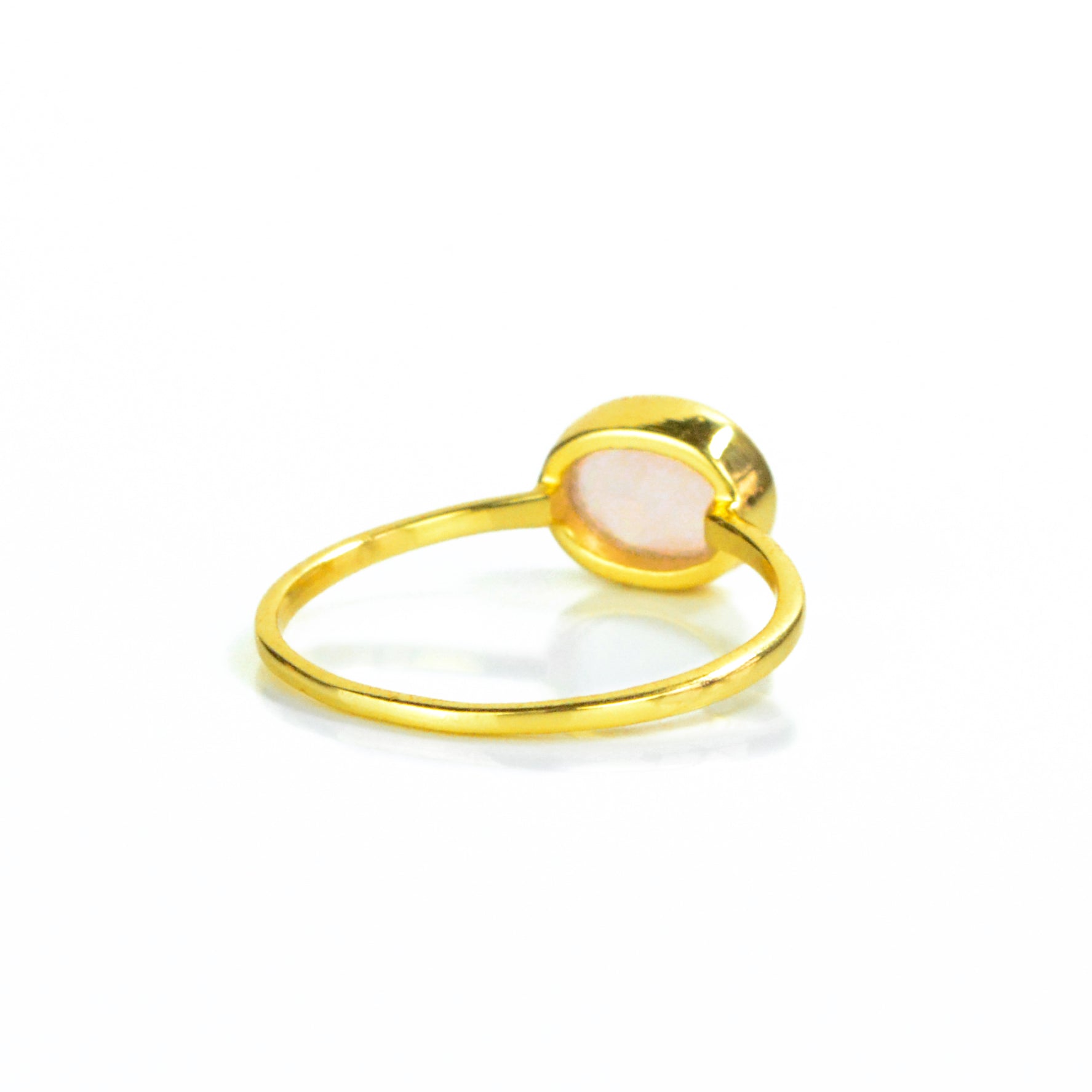 back of gold pink chalcedony ring on white. stack set, stacking rings, gemstone ring, birthstone ring, mother's day gift for her, gift for mom, gift for fiance, gift for girlfriend, wedding jewelry, bridesmaid jewelry, anniversary jewelry, anniversary gift, birthday gift, christmas gift, valentine's day gift, valentine's day rings, dainty ring, cocktail ring, statement ring, bezel set.