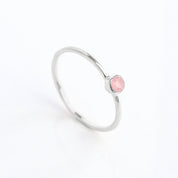 sterling silver dainty 3mm pink chalcedony gemstone ring. October  birthstone. On white background. 925 sterling silver, birthstone ring, stacking ring, stackable, birthstone jewelry, facet gemstone