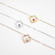 gold plated open square minimalist necklace with ruby birthstone, july birthstone july gemstone. birthstone jewelry. minimalist jewelry. sterling silver open square with iolite birthstone, rolse gold plated open square necklace with peridot birthstone. august birthstone. 