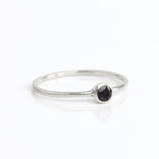 sterling silver dainty 3mm black onyx gemstone ring. december birthstone. On white background. 925 sterling silver, birthstone ring, stacking ring, stackable, birthstone jewelry, facet gemstone