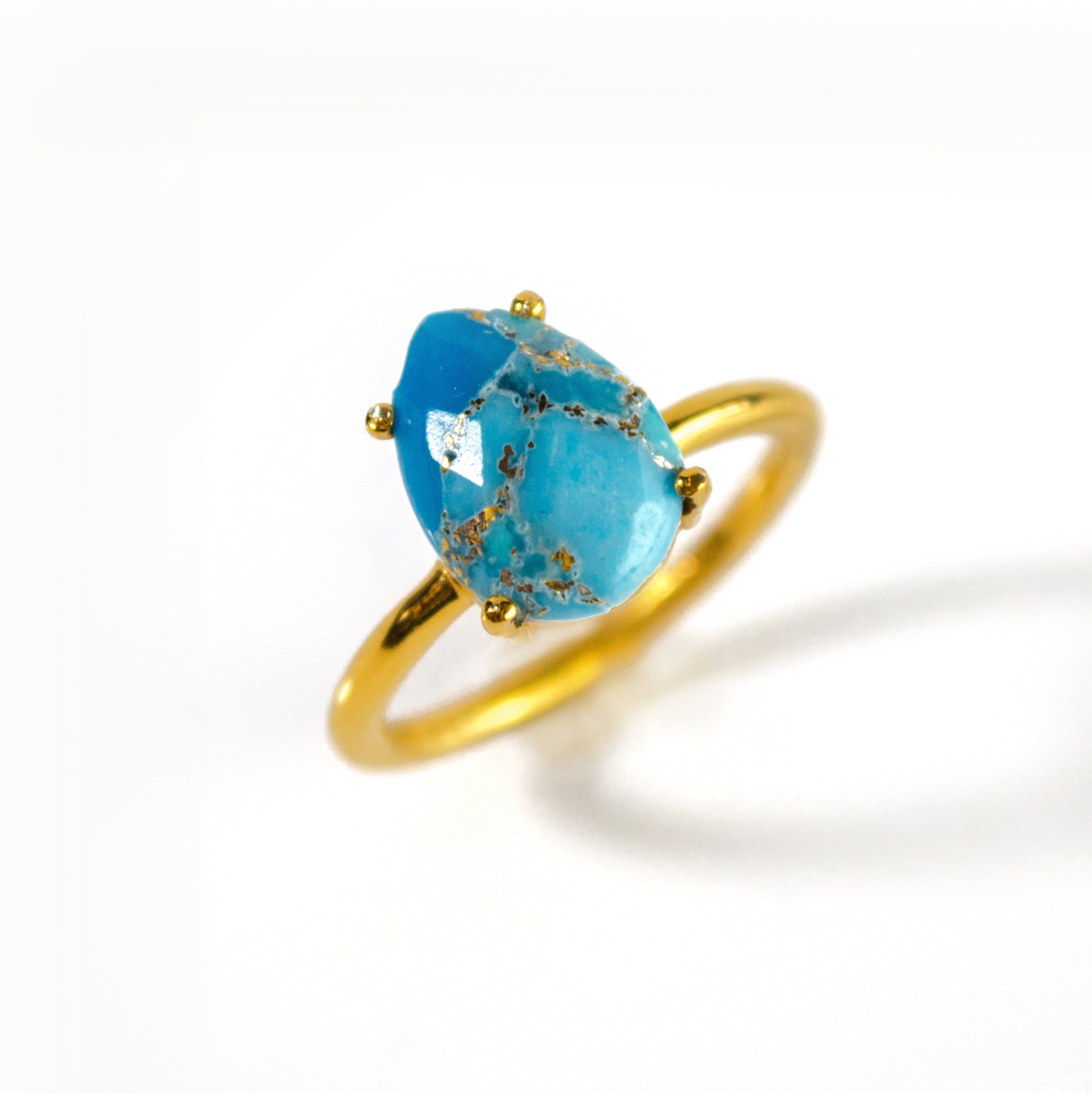 turquoise-prong-teardrop-gold-ring_621a596a-62ac-4701-a61e-818569641e02.jpg